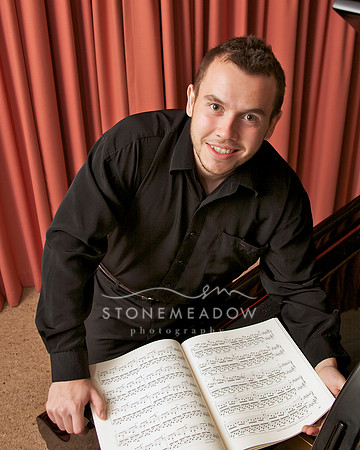 At the piano