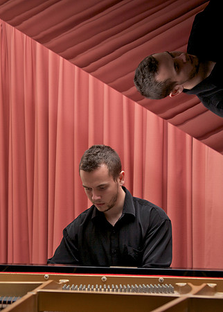 At the piano